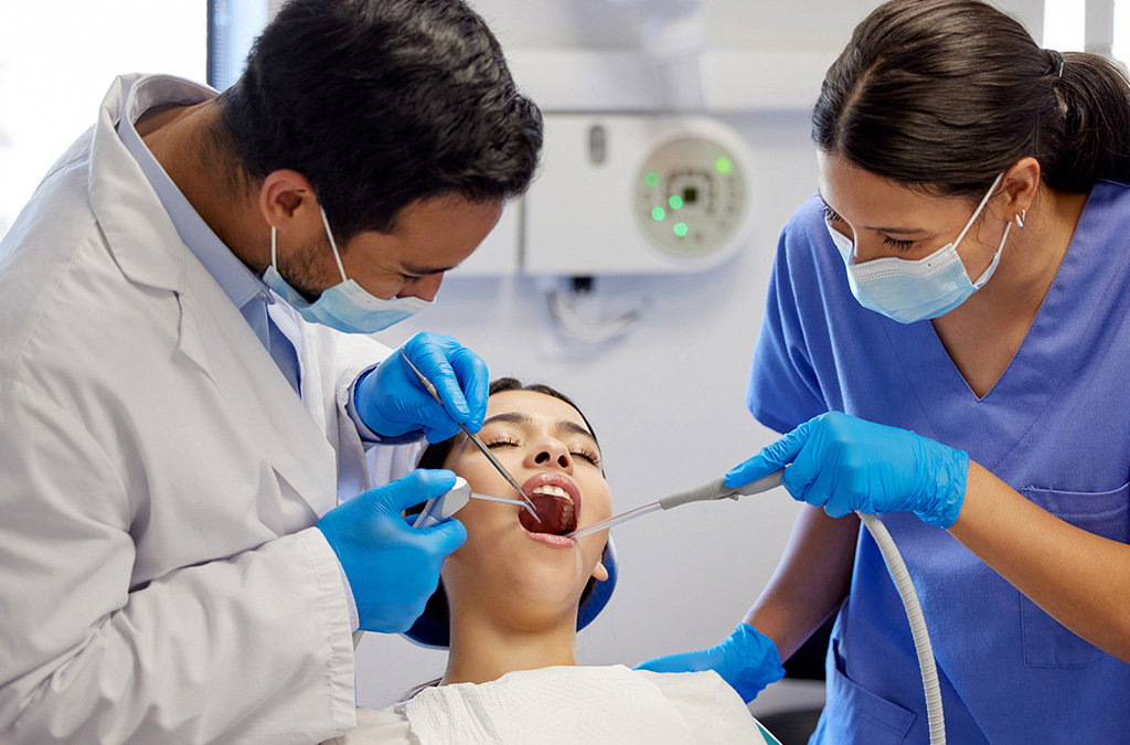 Patient receiving a dental check-up to maintain oral health